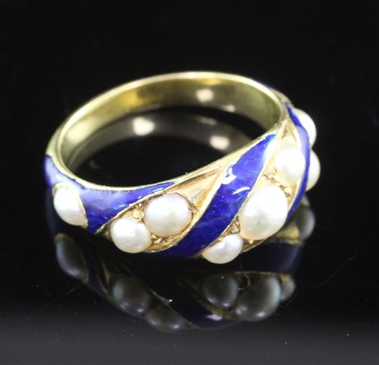 A 19th century gold, blue enamel and split pearl mourning ring, size L.
